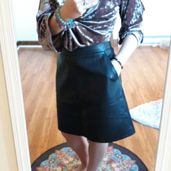 Zara Dresses & Skirts - Zara black faux leather skirt with pockets